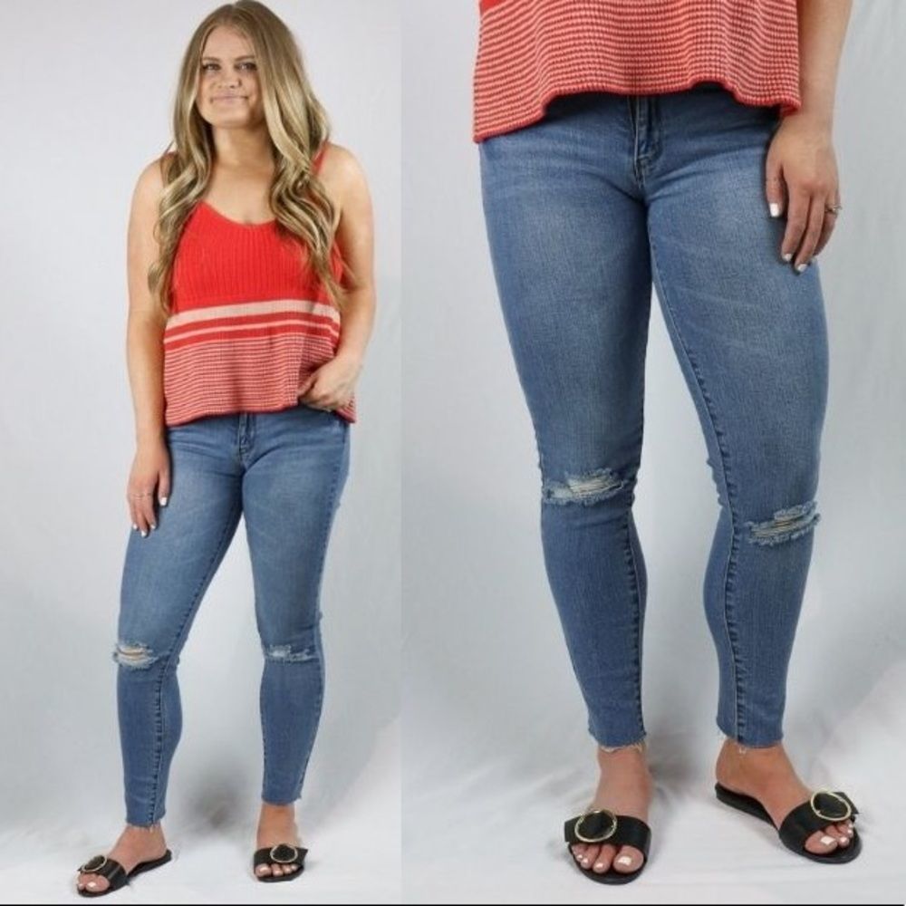 Mid-rise distressed skinny jeans NWT